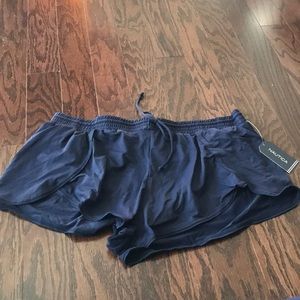 Navy blue swim shorts.